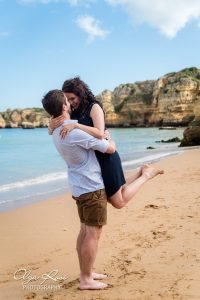 Beach proposal photography with stunning view over Dona Ana beach in Algarve by Olga Rosi